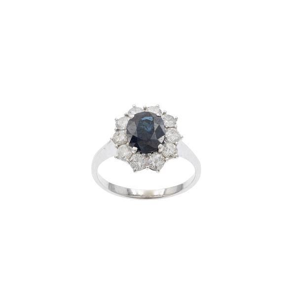 Anello in oro bianco 18kt zaffiro e diamanti