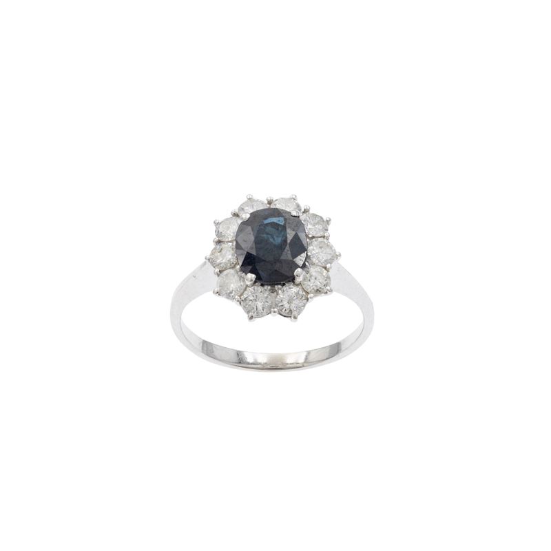 Anello in oro bianco 18kt zaffiro e diamanti