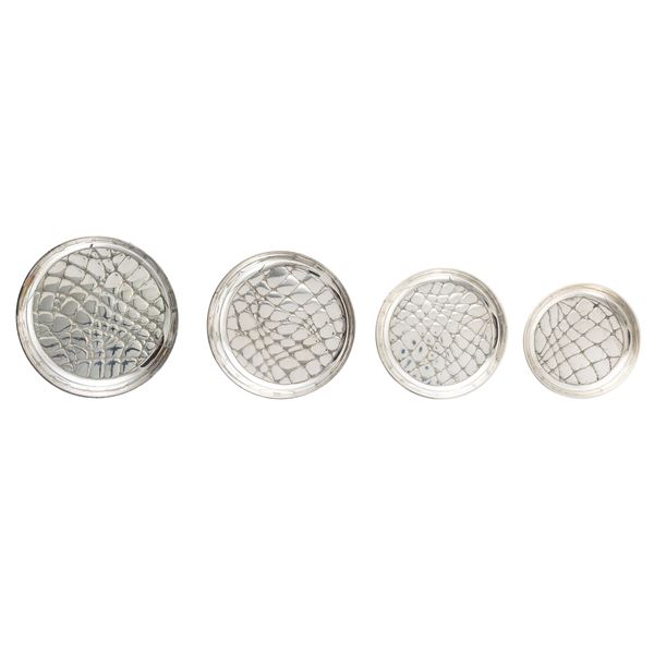 Set di quattro centrotavola circolari in argento