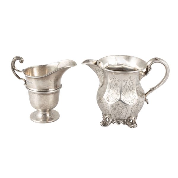 Group of two silver milk jugs