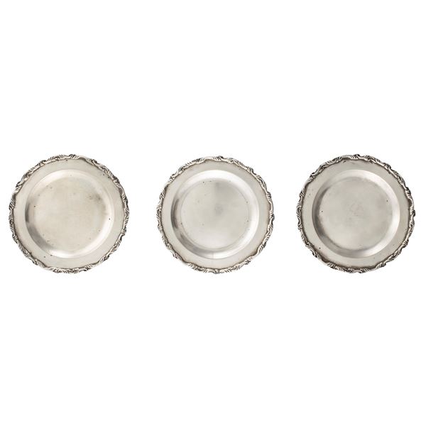 Set di tre piattini sottobottiglia in argento