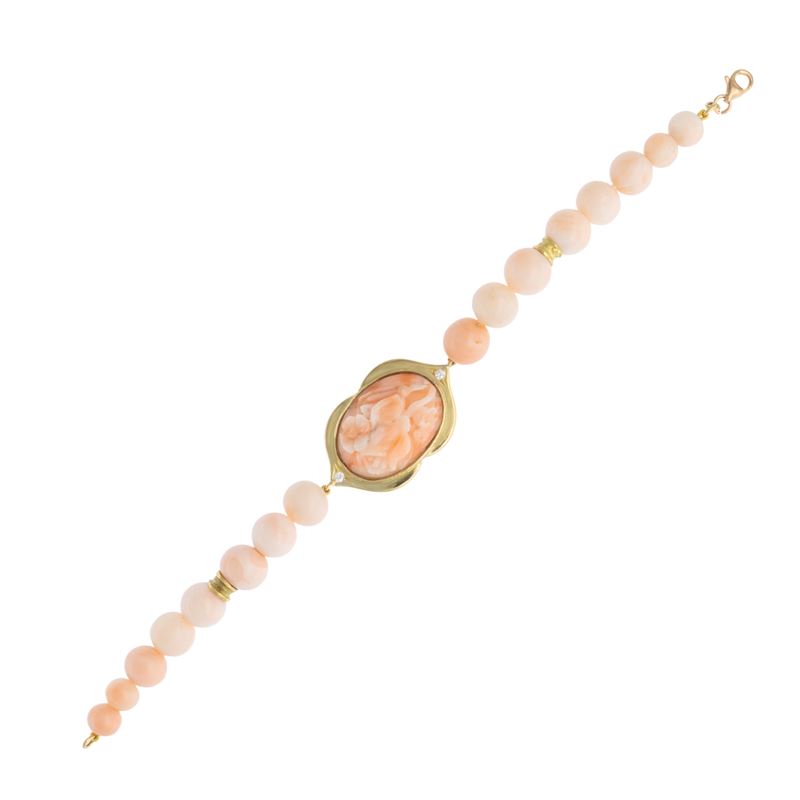 Bracciale in oro giallo 18kt e corallo rosa