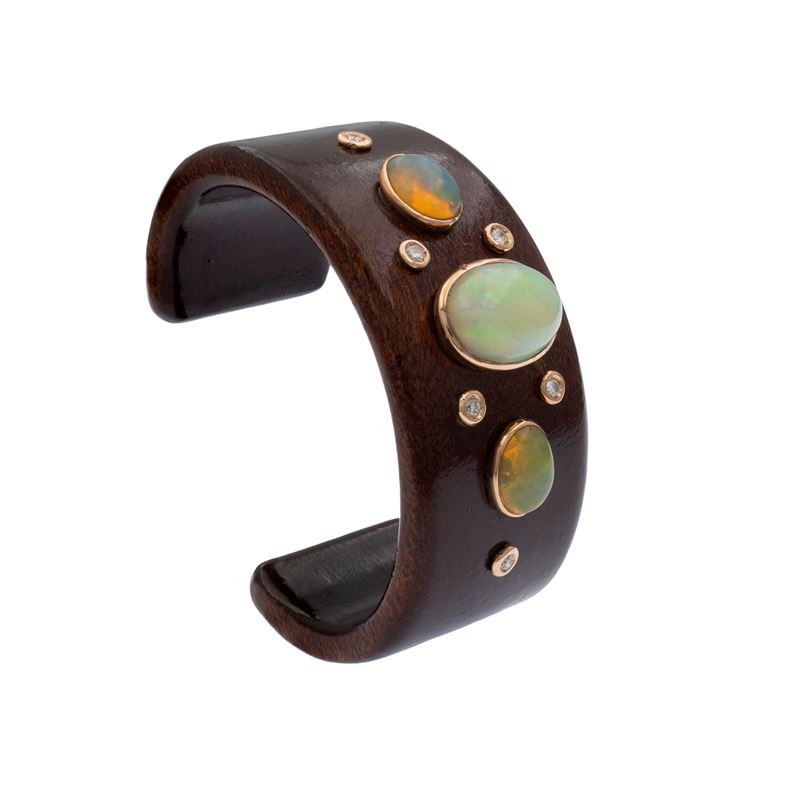 Bracciale a manetta in legno e oro giallo 18kt