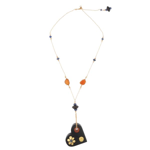 Collana in oro a due colori 18kt con pendente a cuore in legno