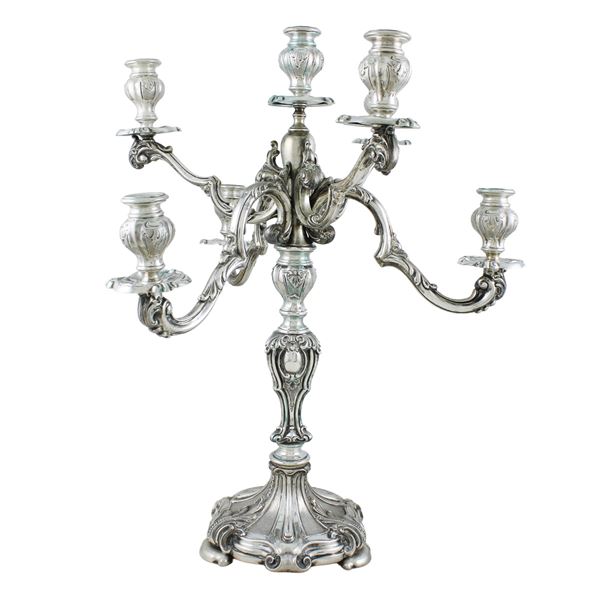 Grande candelabro in argento a sette luci