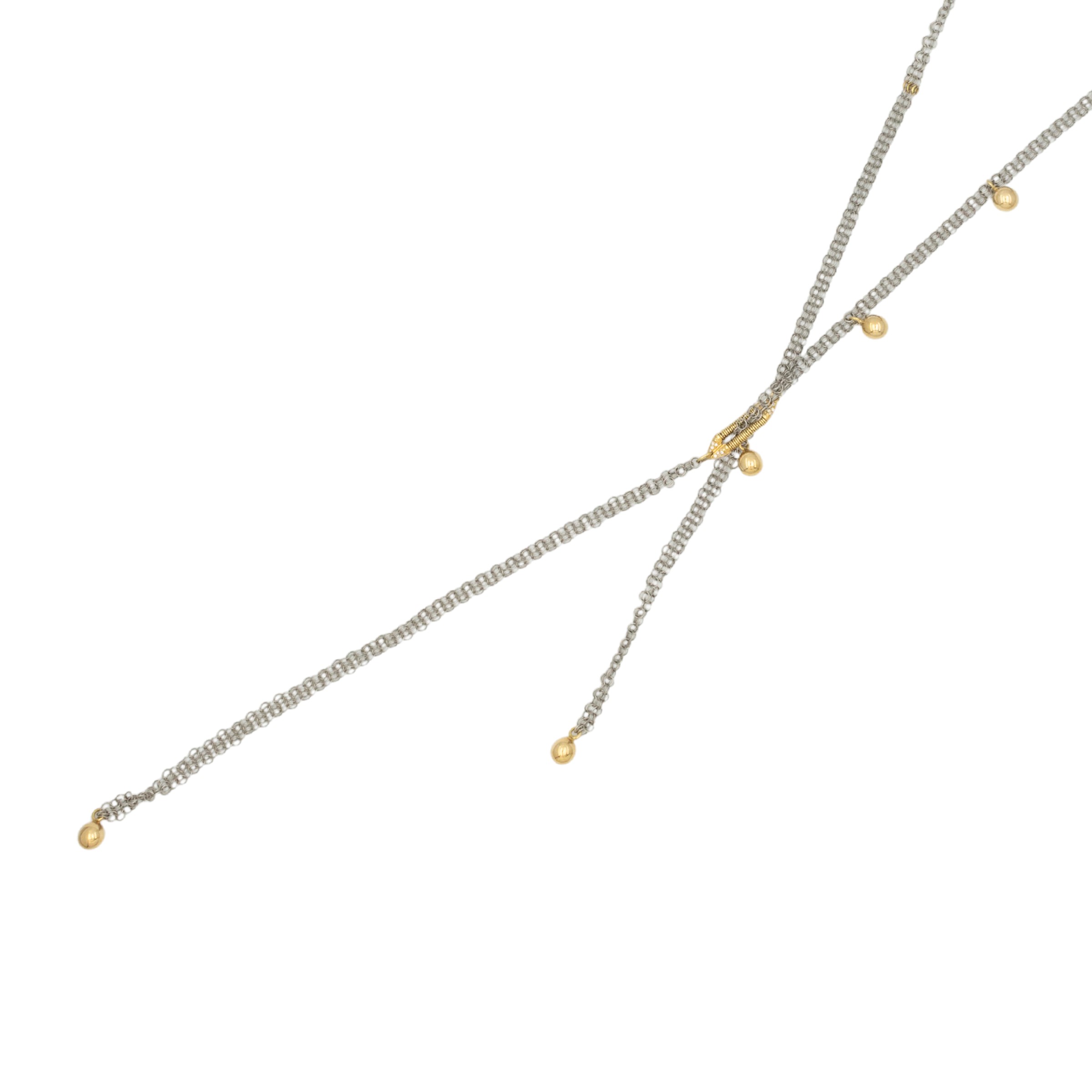 Lunga collana a maglia in acciaio e oro giallo 18kt