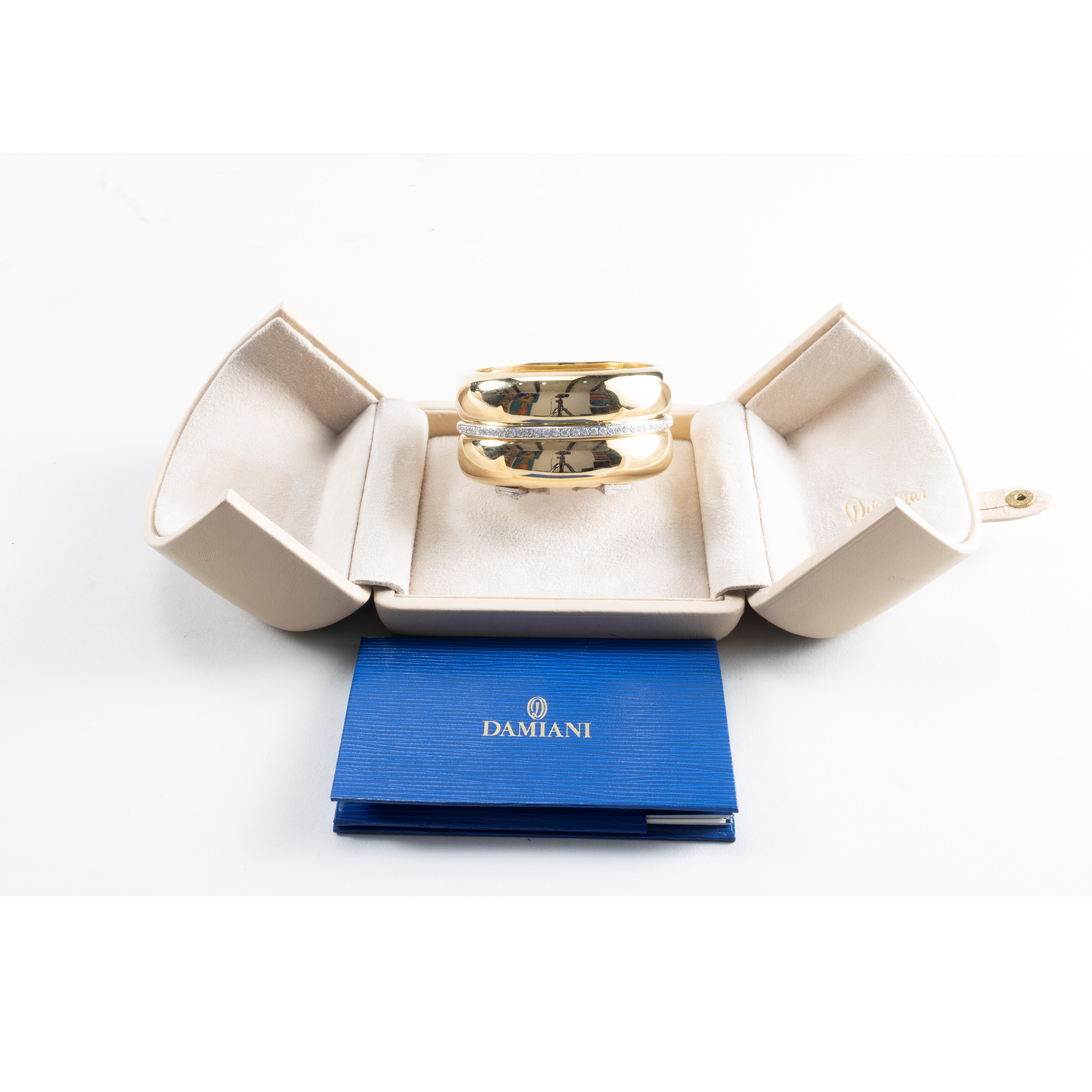 Damiani - Bracciale a manetta in oro giallo e bianco con diamanti