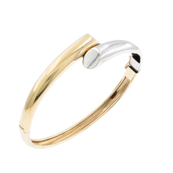 Bracciale contrarié a manetta in oro giallo e bianco 18kt