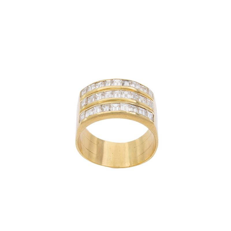 Anello a fascia in oro giallo 18kt tre rivière di diamanti
