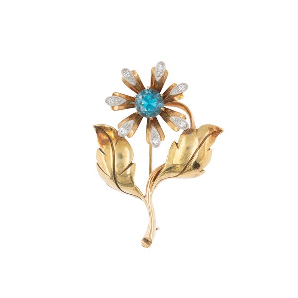 Spilla a motivo floreale in oro giallo 14kt