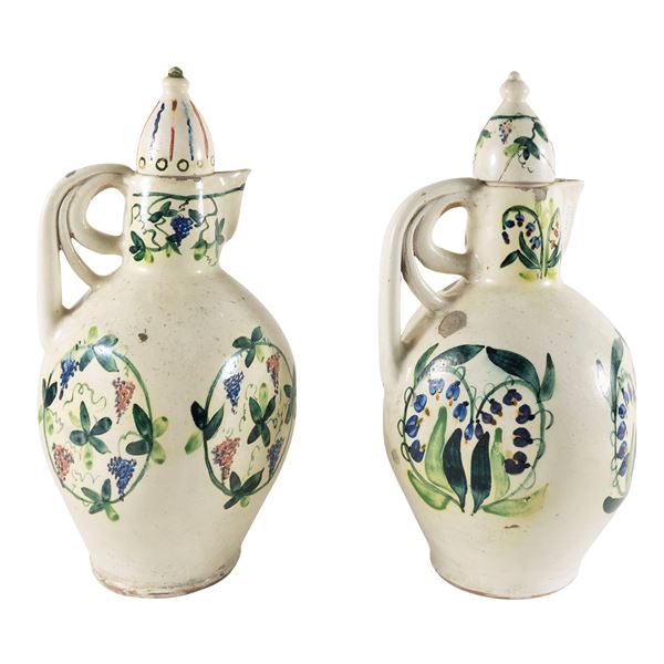 Pair of majolica pourers