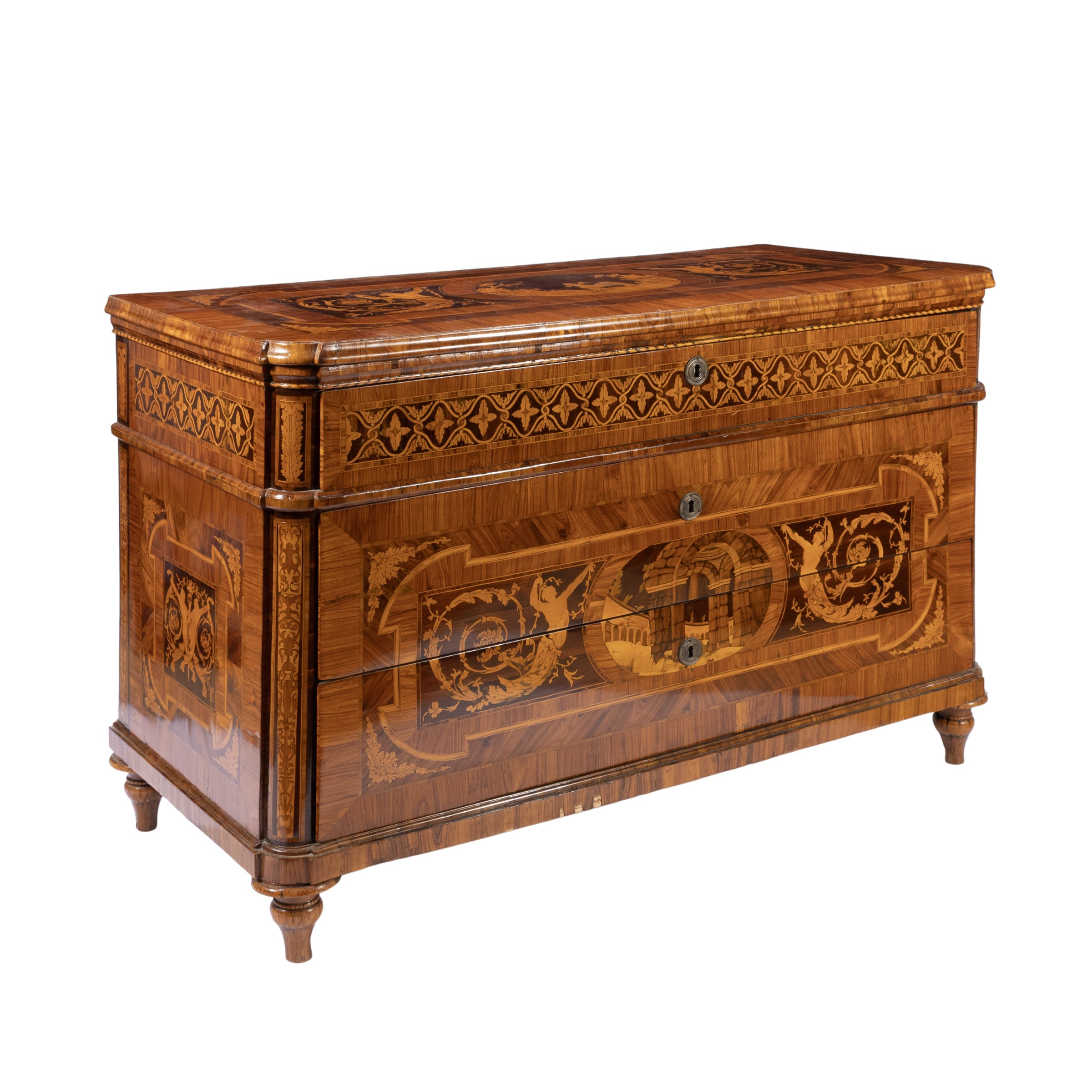 Cassettone lastronato ed intarsiato in legni vari