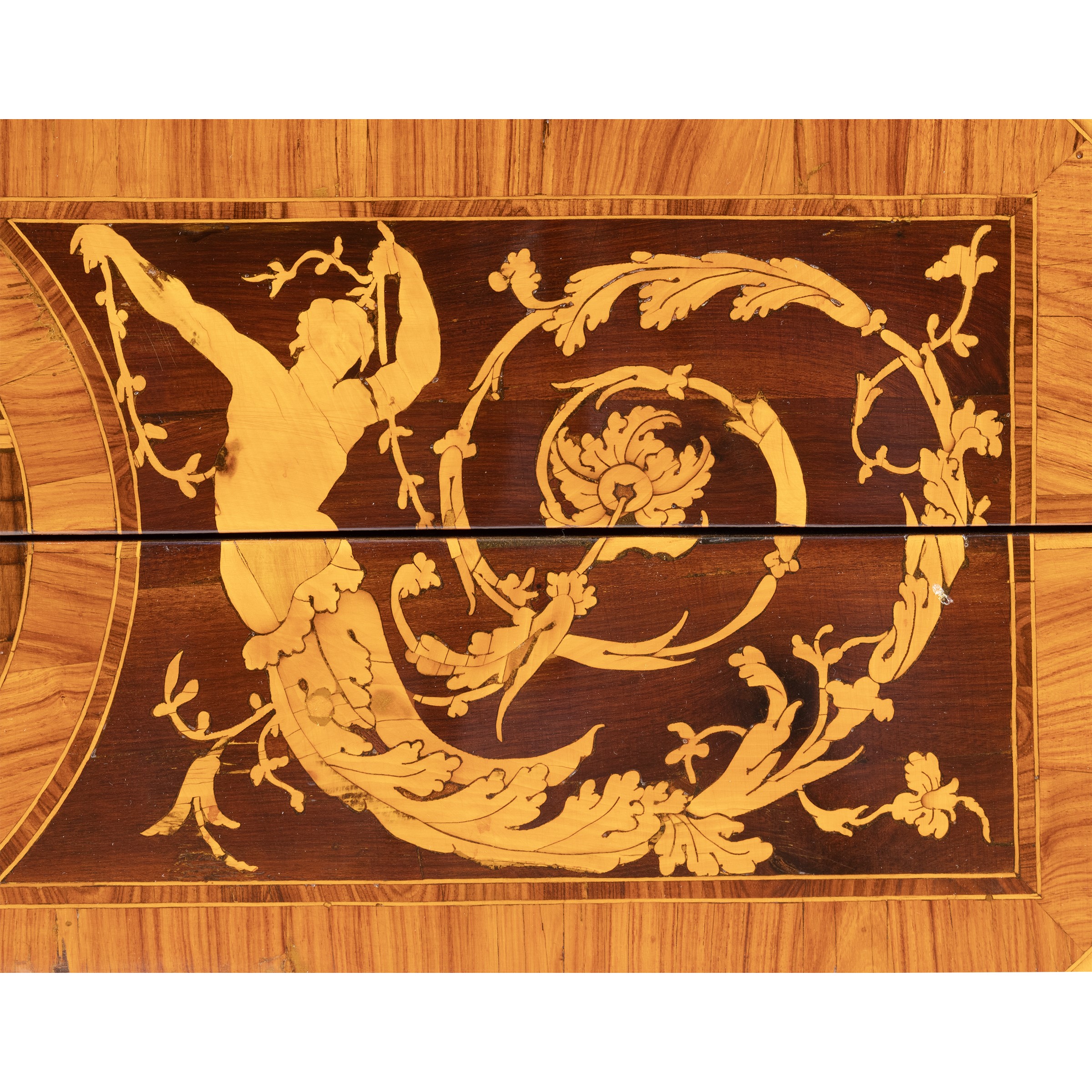 Cassettone lastronato ed intarsiato in legni vari