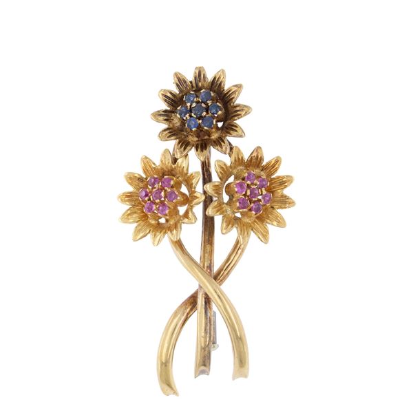 Spilla a motivo floreale in oro giallo 18kt