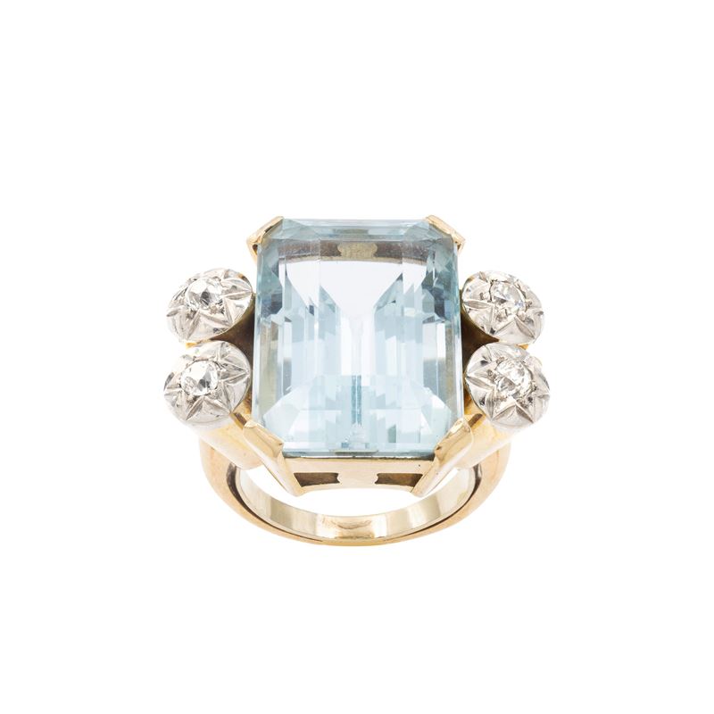 Anello a ponte in oro giallo e bianco 18kt con acquamarina e diamanti