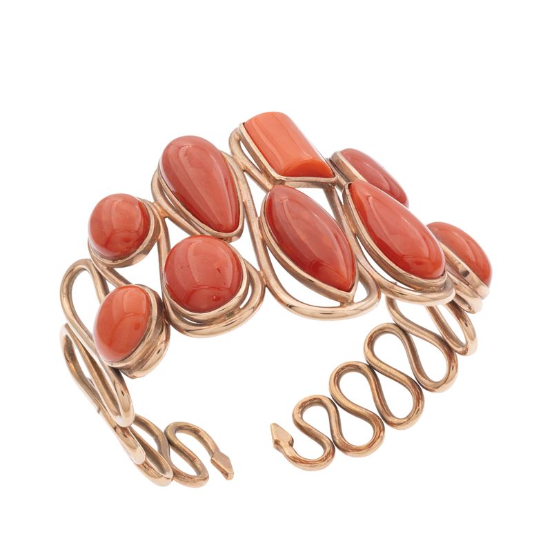 Bracciale a manetta in oro rosso 18kt e coralli