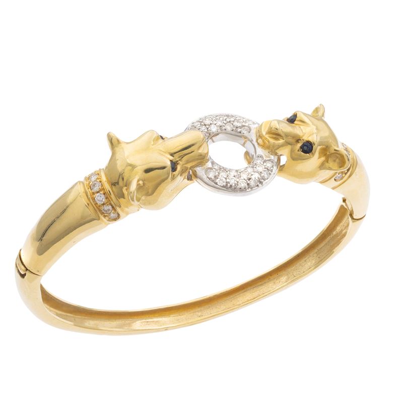 Bracciale a manetta con teste pantere