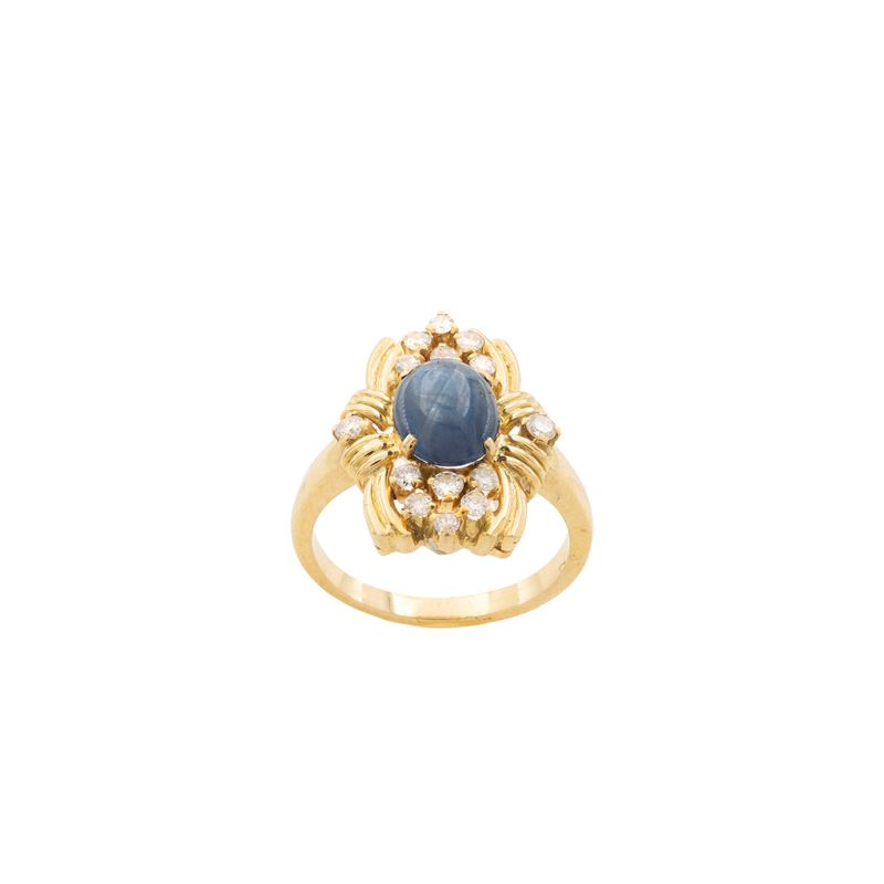 Anello in oro giallo 18kt zaffiro e diamanti