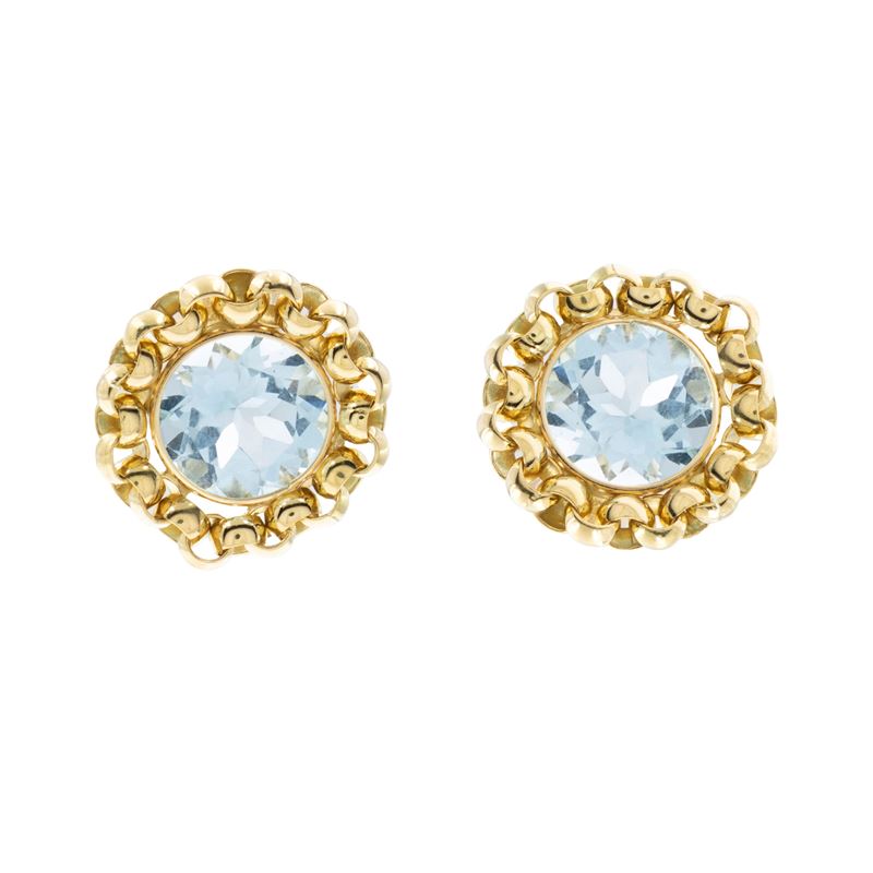 Orecchini a lobo in oro giallo 18kt due topazi azzurri