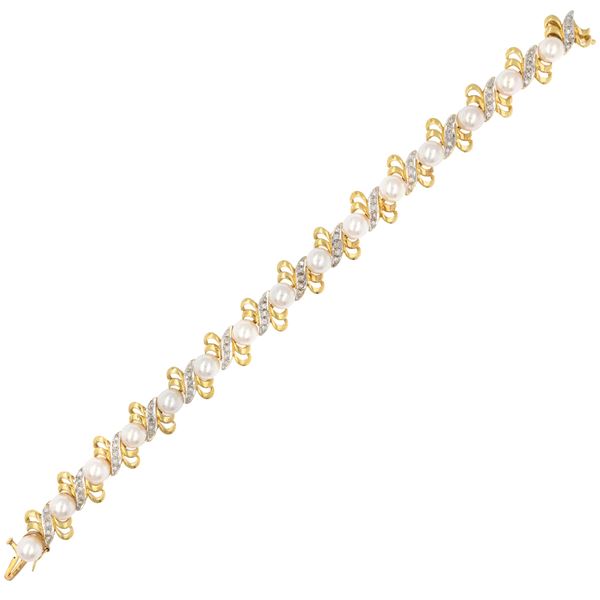 Bracciale in oro giallo e bianco 18kt perle coltivate e diamanti