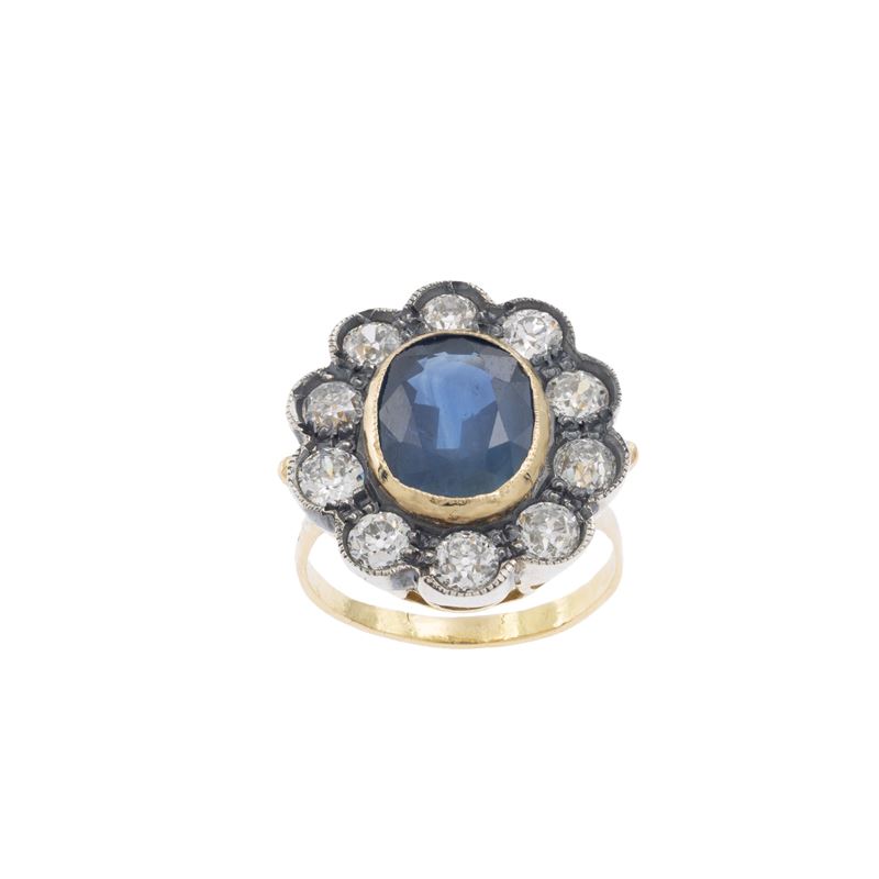 Antico anello in oro e argento con zaffiro naturale e diamanti