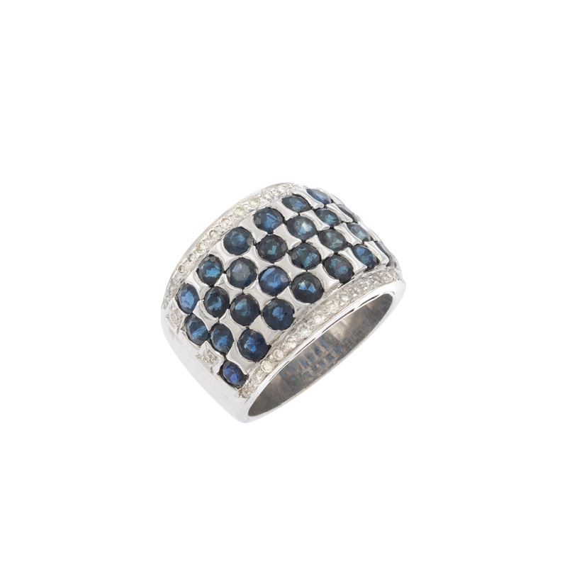 Anello a fascia in oro bianco 18kt zaffiri e diamanti