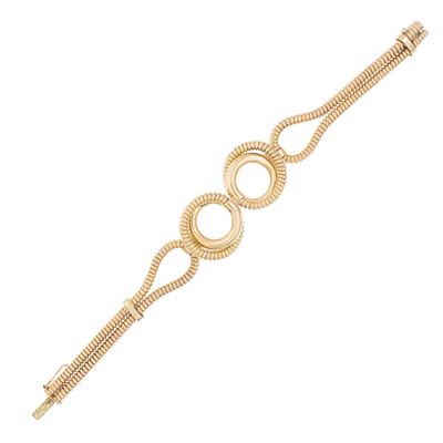 Bracciale tubogas a spirale in oro giallo 18kt, peso 25 gr.