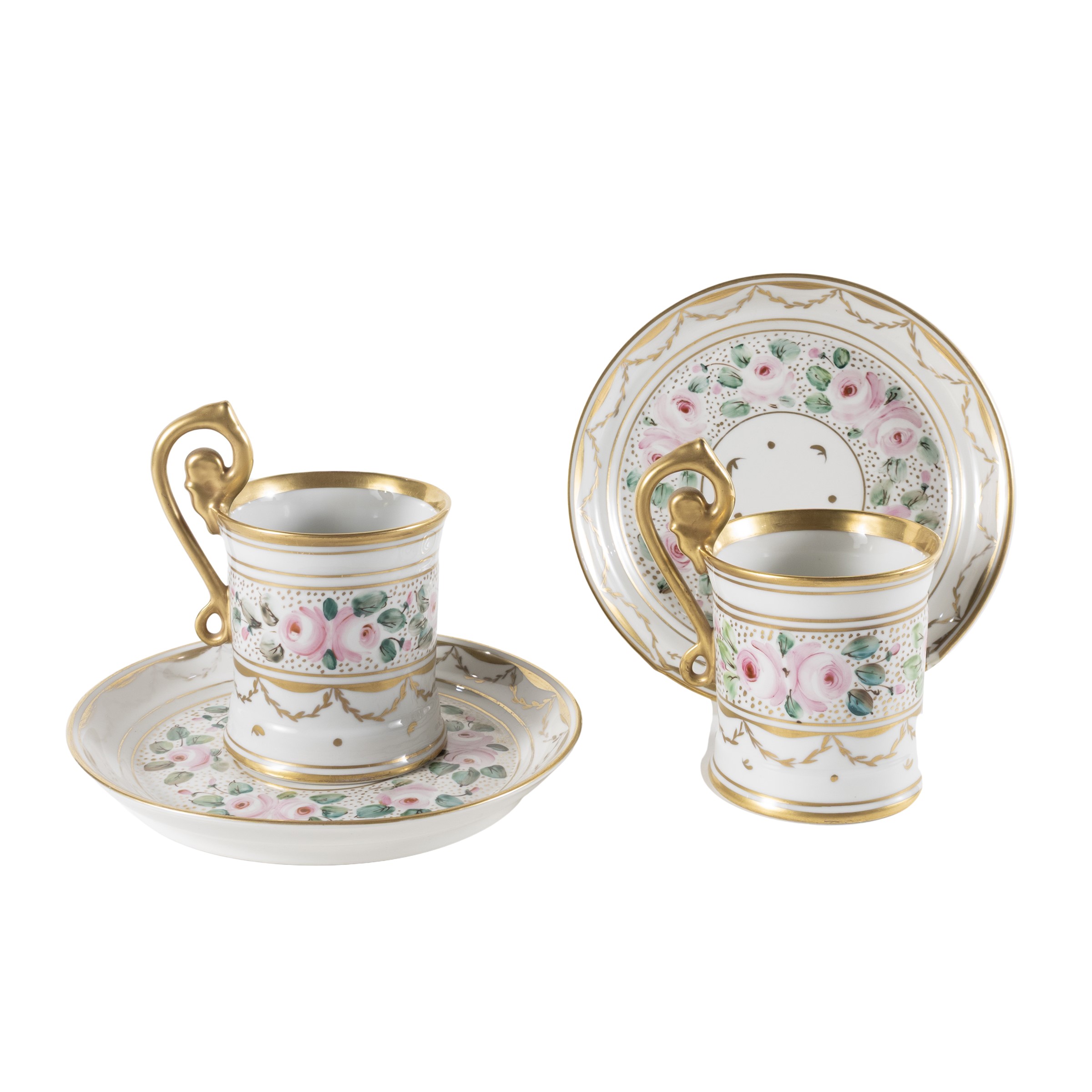 Coppia di tazze con piattino in porcellana