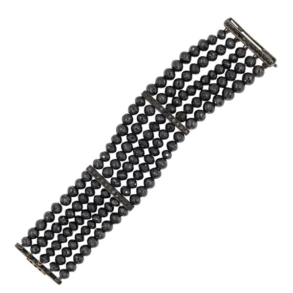 Bracciale in oro bianco 18kt a sei fili di spinelli neri