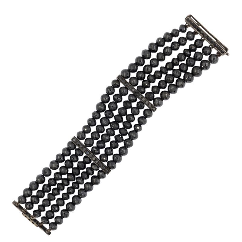 Bracciale in oro bianco 18kt a sei fili di spinelli neri