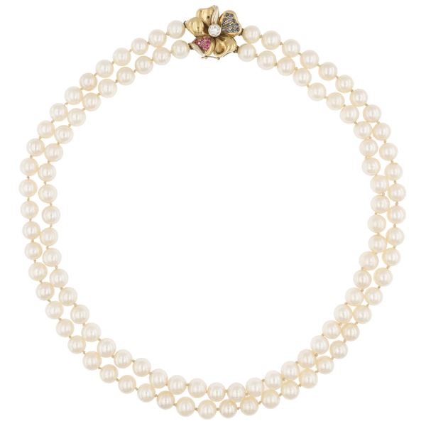 Collana a due fili di perle coltivate riuniti da chiusura a quadrifoglio