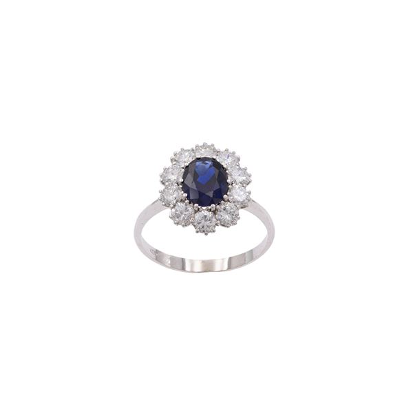 18kt white gold with natural sapphire and diamonds ring