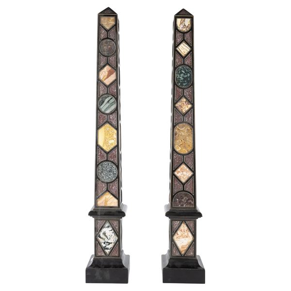 Pair of ebonized wood and marble obelisks