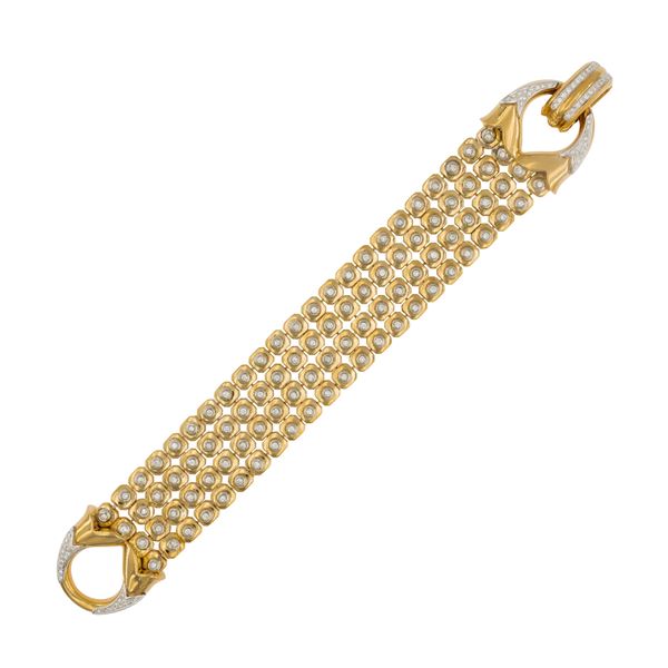 Bracciale a fascia morbida in oro giallo 18kt e diamanti