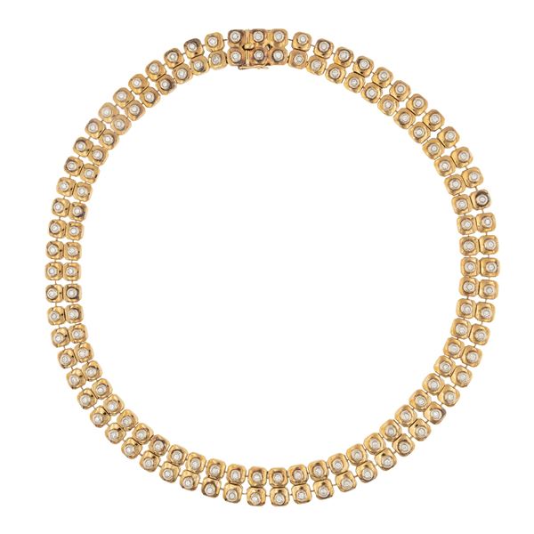 Collana a fascia morbida in oro giallo 18kt e diamanti