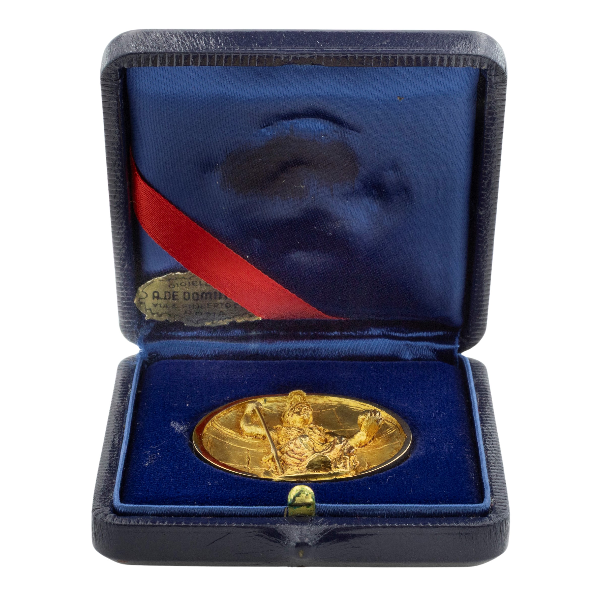 Scultura scolpita ad alto rilievo in oro giallo 18kt