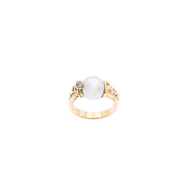 Anello in oro giallo 18kt perla coltivata e diamante  (firmato Misani, Milano)  - Asta GIOIELLI E OROLOGI WEB LIVE - Colasanti Casa d'Aste