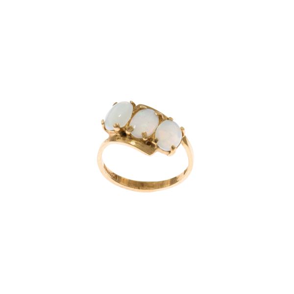 14kt yellow gold ring with three harlequin opals