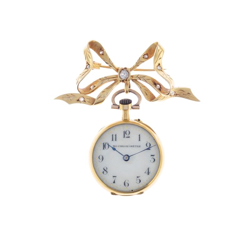 Spilla a fiocco da orologio, oro giallo 18 kt con diamante, primi '900