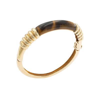 Bracciale a manetta in oro giallo 18kt con occhio di tigre