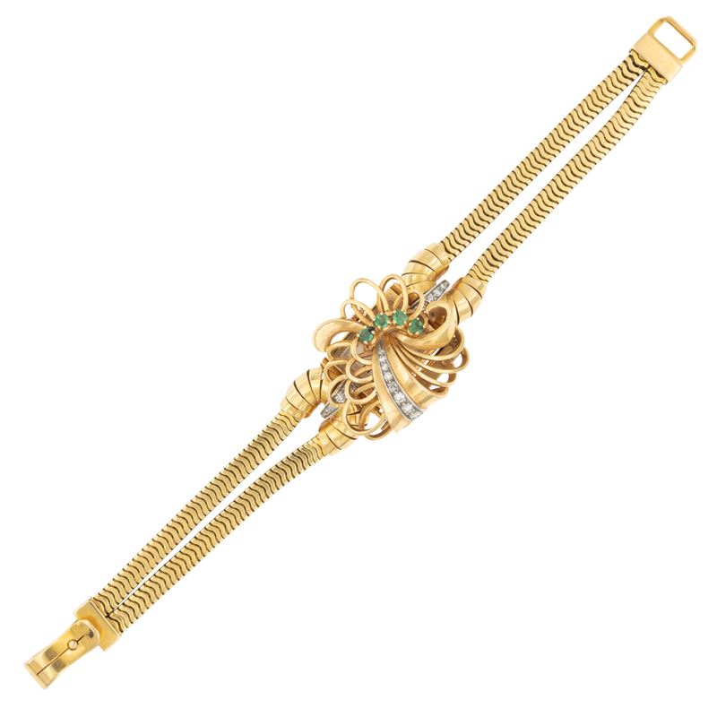 Bracciale con orologio a scomparsa in oro giallo 18kt smeraldi e diamanti