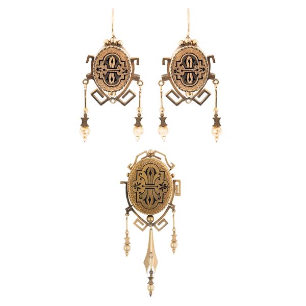 Antica demi parure in oro giallo 12kt e smalto nero