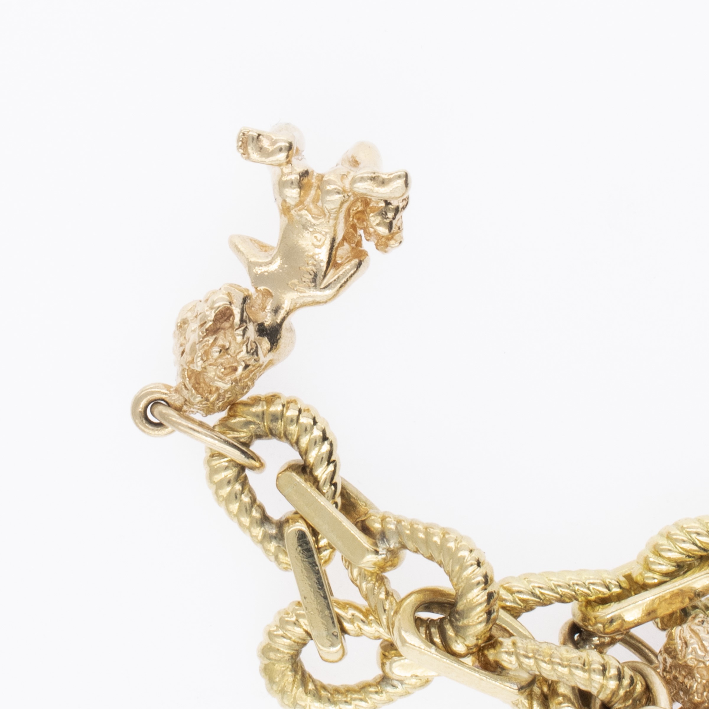 Bracciale con Sette Putti Pendenti in Oro a Due Colori 18kt