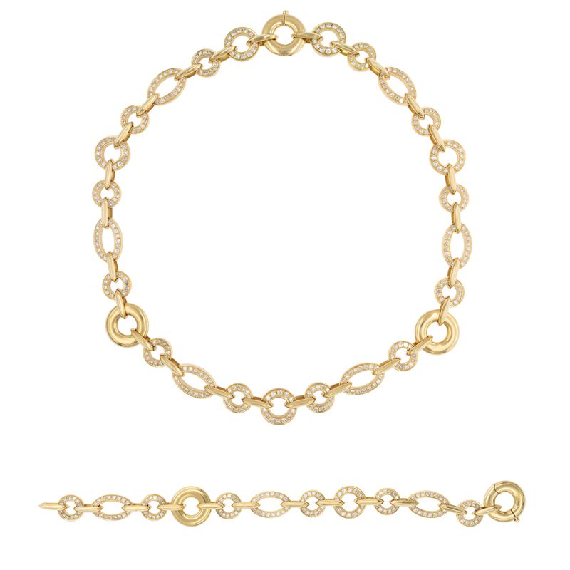 Collana e bracciale in oro giallo 18kt e diamanti