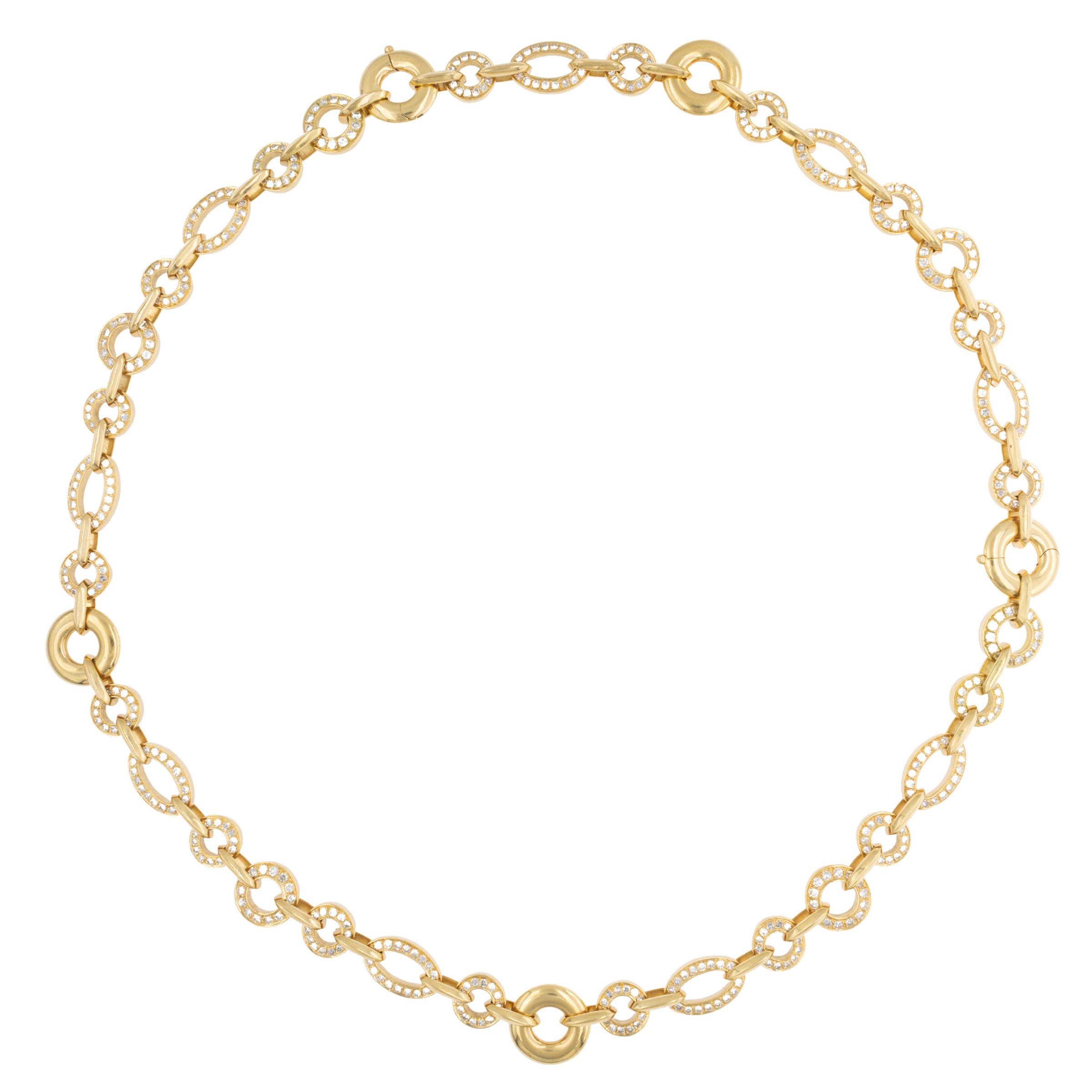 Collana e bracciale in oro giallo 18kt e diamanti