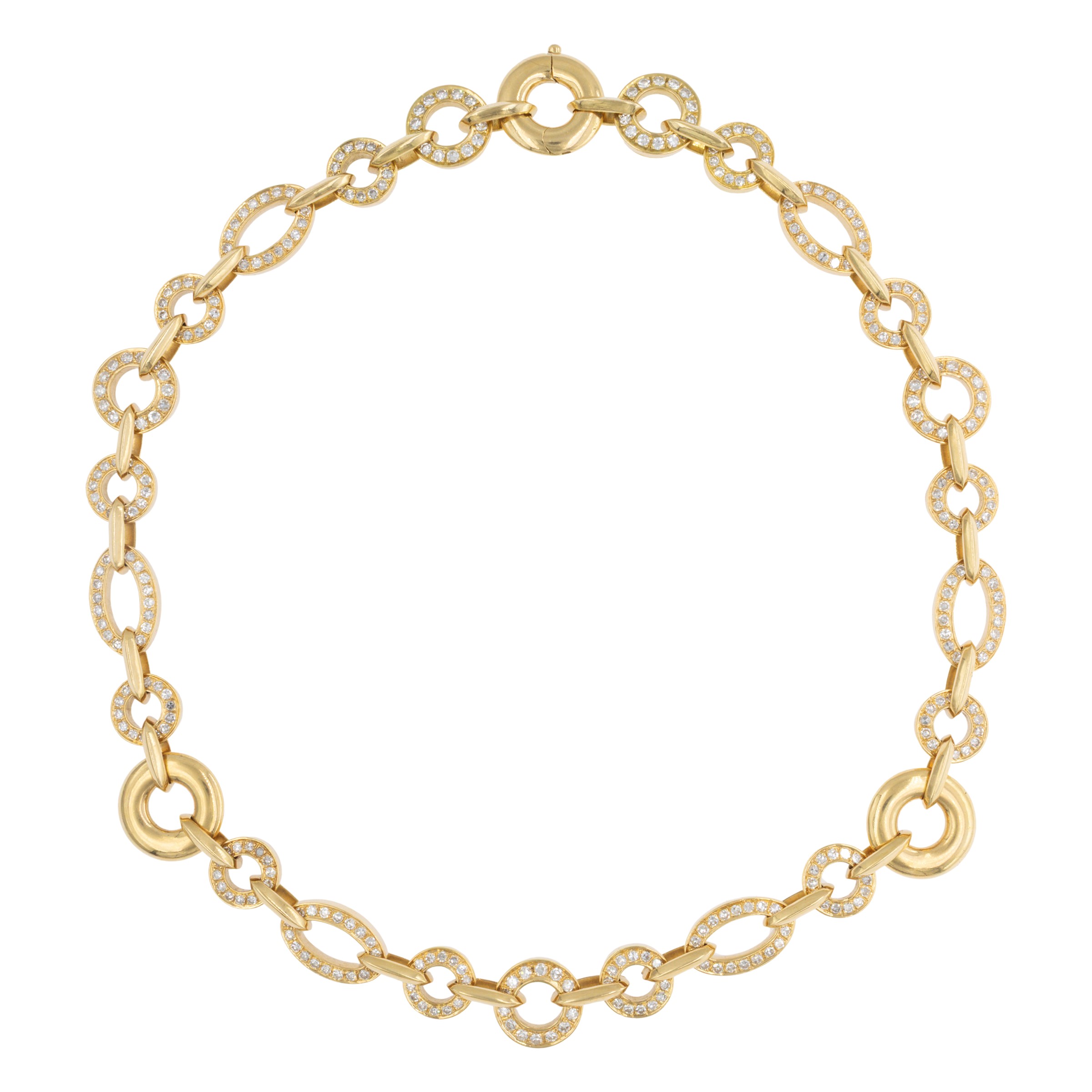 Collana e bracciale in oro giallo 18kt e diamanti