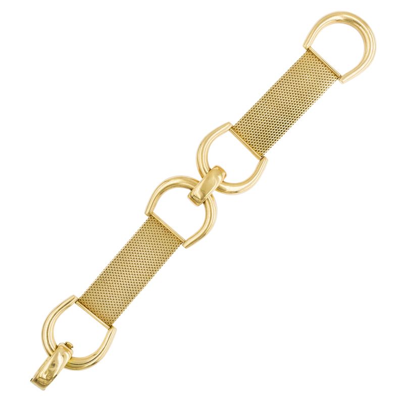 Bracciale staffe in oro giallo 18 kt, anni '70