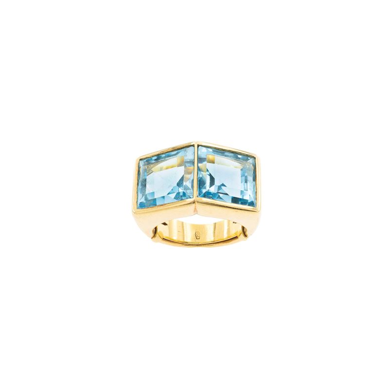 Anello a ponte in oro giallo 18kt con topazi azzurri, misura 17