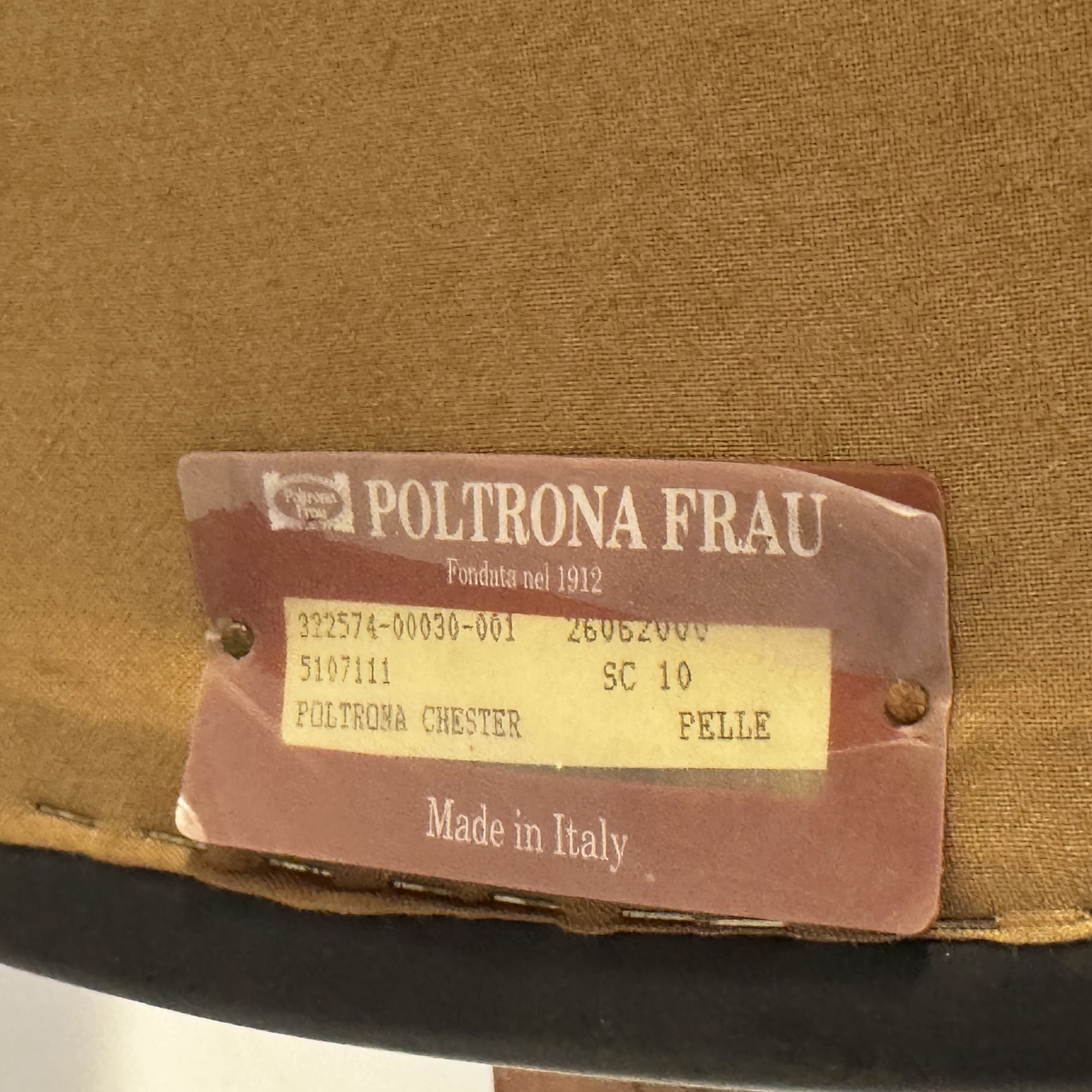 Poltrona Chester, pelle imbottita e marchio Produttore Poltrona Frau, Italia, XX secolo