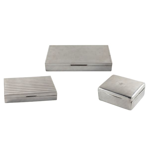 Group of three  silver and wood cigarette boxes